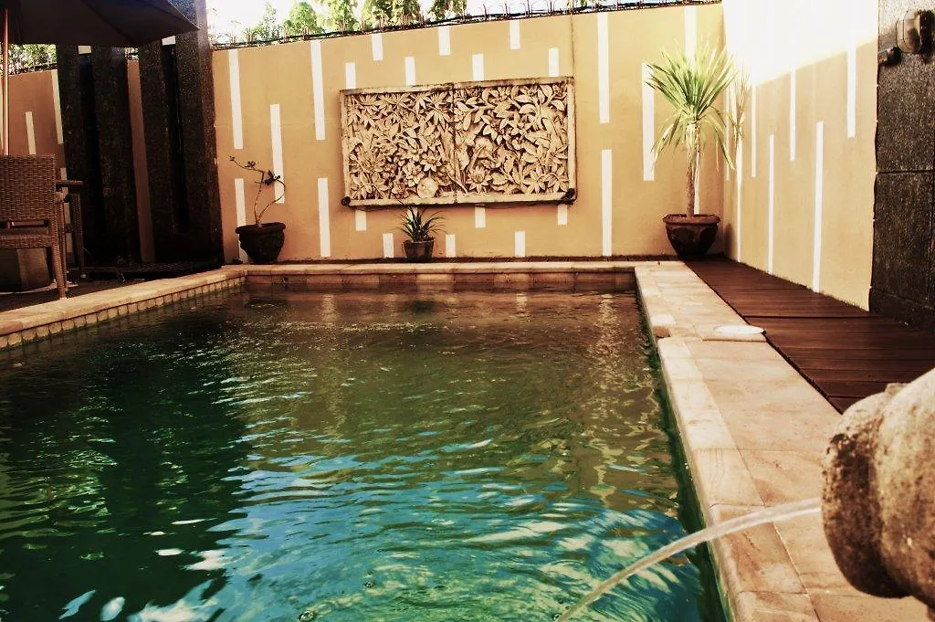 Cozy Palm Hotel Kuta Selatan