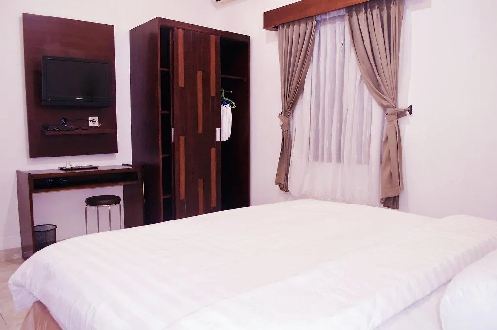 Cozy Palm Hotel Kuta Selatan